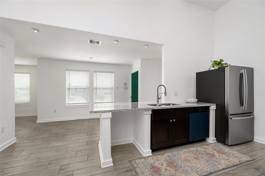 Unit B Kitchen and Entry Unit B Kitchen and Entry