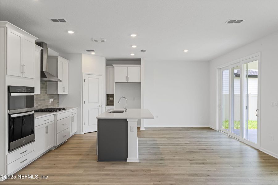Furnished interior view inside a new home in Beacon Lake, St. Augustine (Image 6).