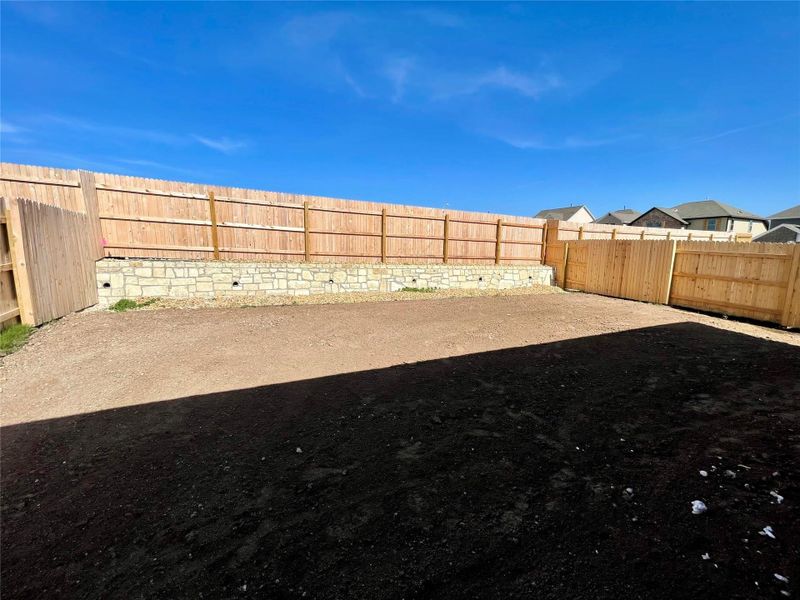 Front exterior of a new home in Covered Bridge, Hutto, TX, highlighting curb appeal (Image 15). Front exterior of a new home in Covered Bridge, Hutto, TX, highlighting curb appeal (Image 15).