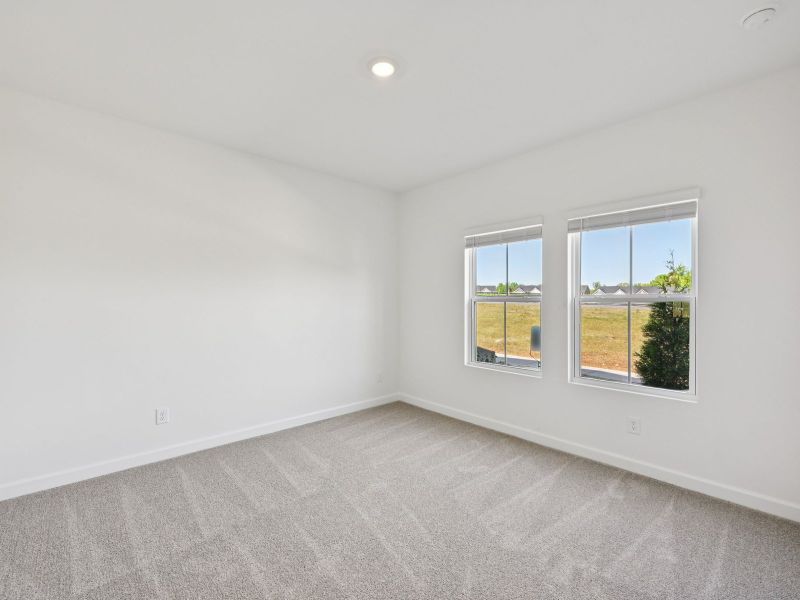 Spacious, unfurnished interior of a new home in Meadows at Wilson Farms - The Heights Series, Fort Mill (Image 15). Spacious, unfurnished interior of a new home in Meadows at Wilson Farms - The Heights Series, Fort Mill (Image 15).