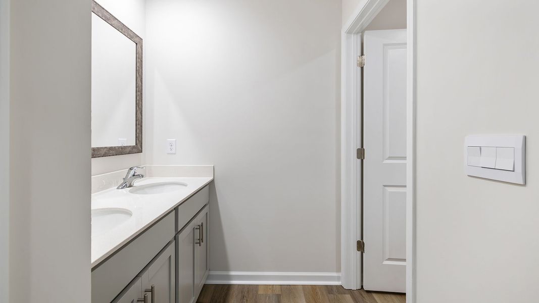 Furnished interior view inside a new home in Bentley Park, Greenwood (Image 12).