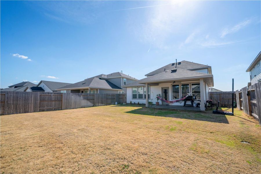 Exterior details and patio area of a home in Mason Woods, Cypress (Image 28). Exterior details and patio area of a home in Mason Woods, Cypress (Image 28).