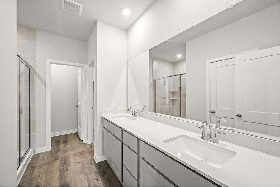 Furnished interior view inside a new home in Sunterra, Katy (Image 10).
