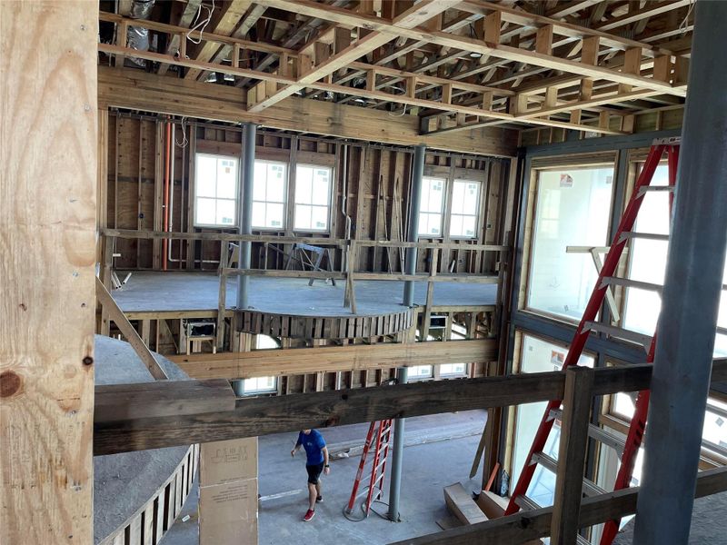 View from second story overlooking main living space on first floor. View from second story overlooking main living space on first floor.