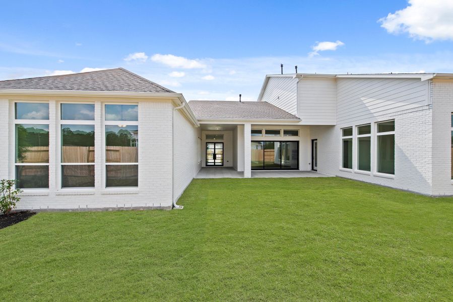 Exterior details and patio area of a home in ARTAVIA®, Conroe (Image 3). Exterior details and patio area of a home in ARTAVIA®, Conroe (Image 3).