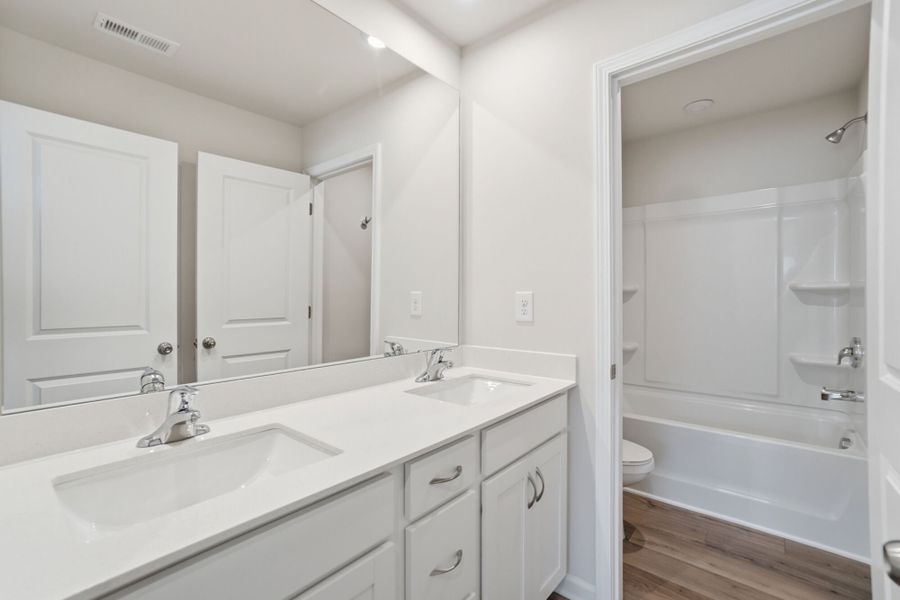 Furnished interior view inside a new home in Waxhaw Landing, Monroe (Image 10).