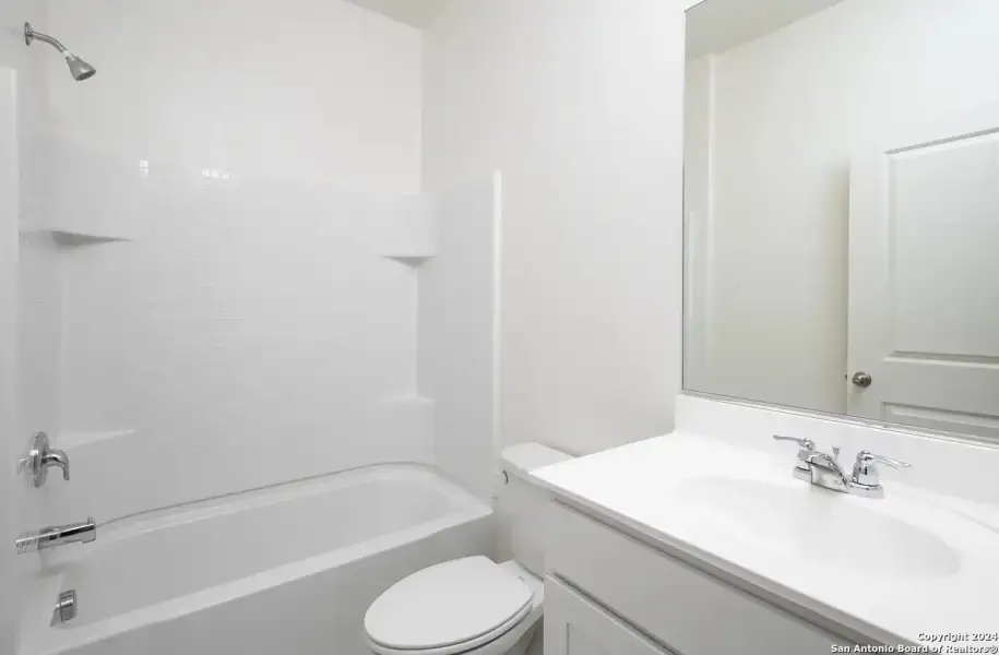 Furnished interior view inside a new home in Hennersby Hollow, San Antonio (Image 10).