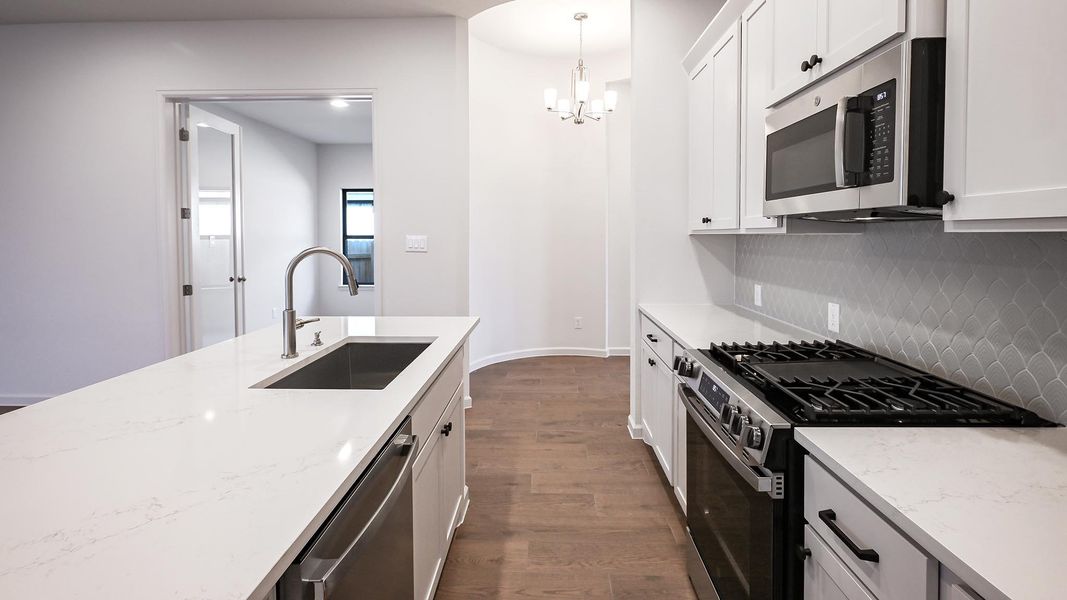 Furnished interior view inside a new home in Crosswinds, Kyle (Image 18).