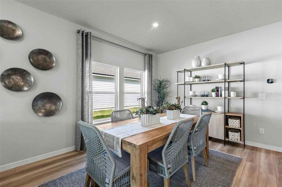 Furnished interior view inside a new home in The Cypress Series at Reserve East, Flagler Beach (Image 18).