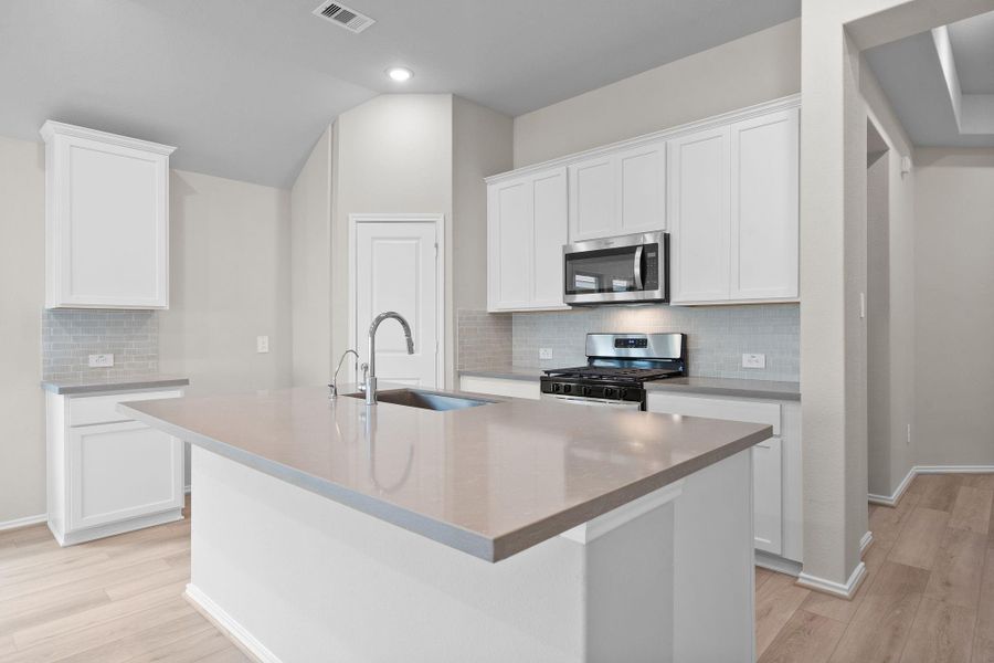 Furnished interior view inside a new home in The Highlands 45', Porter (Image 10).