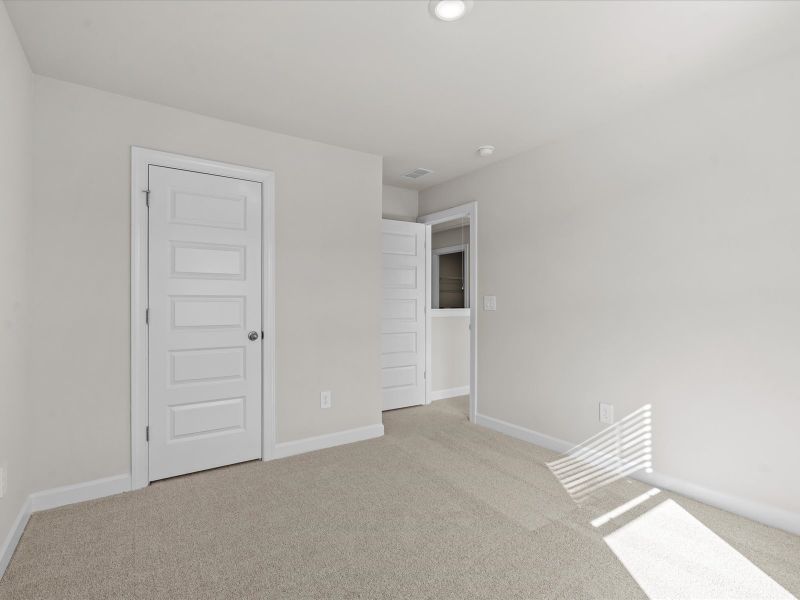 Spacious, unfurnished interior of a new home in The Farm at Wells Creek - Signature Collection, Gray Court (Image 19).