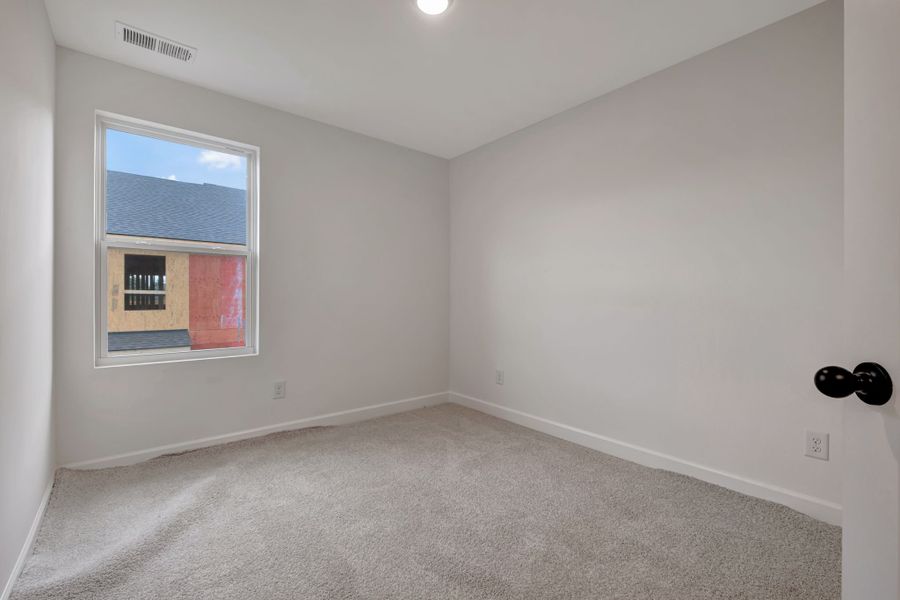 Representative unfurnished interior of a home built from the Ingram Rowhome by Parkside Builders in Anderson Park, Hendersonville (Image 54).