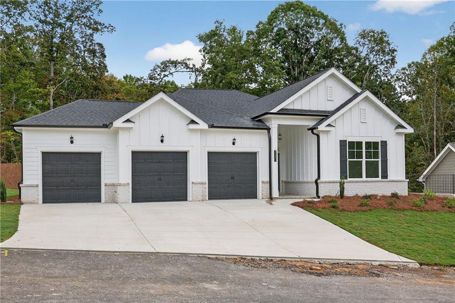 Front exterior of a new home in , Gainesville, GA, highlighting curb appeal (Image 21).