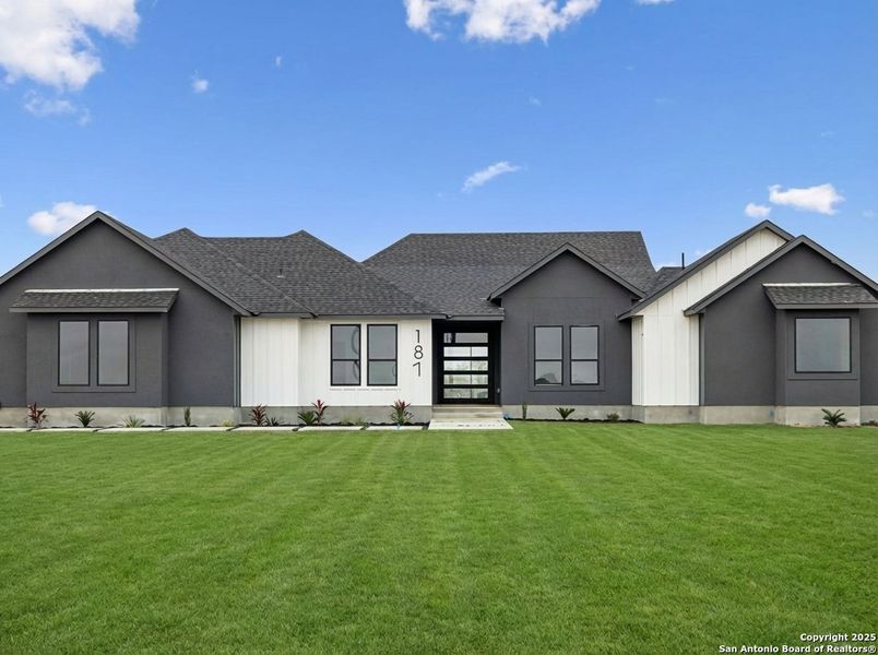Front exterior of a new home in , Floresville, TX, highlighting curb appeal (Image 24). Front exterior of a new home in , Floresville, TX, highlighting curb appeal (Image 24).