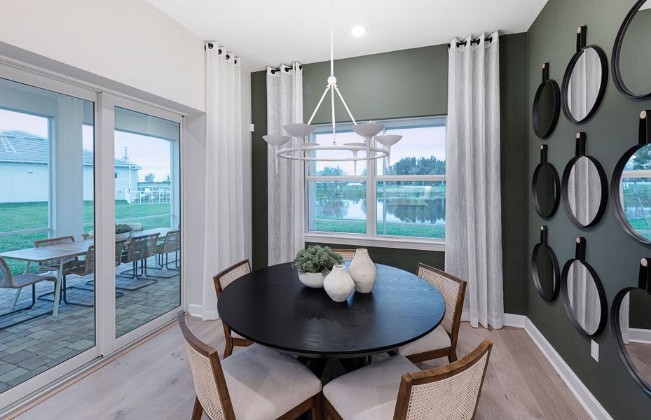 Representative furnished interior of a home built from the Mystique by DiVosta in Emerson Oaks, Vero Beach (Image 9).