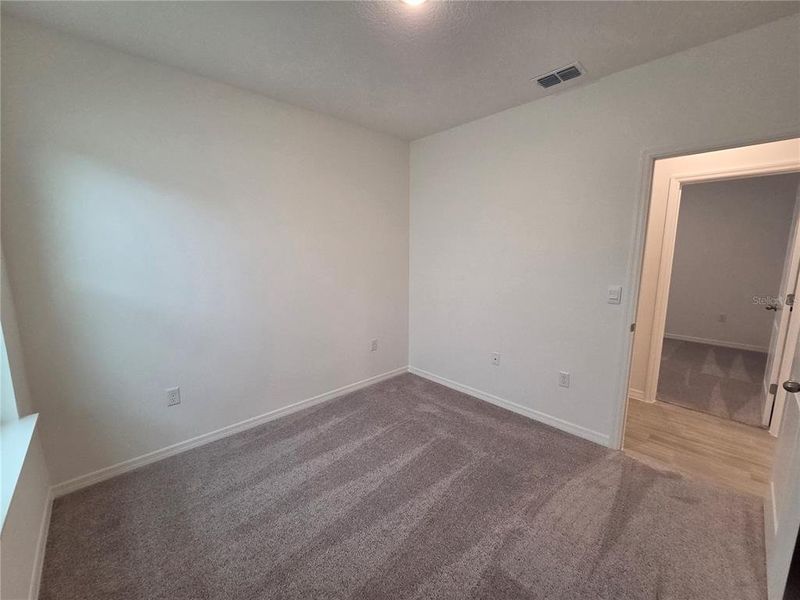 Spacious, unfurnished interior of a new home in Hammock Reserve, Haines City (Image 17). Spacious, unfurnished interior of a new home in Hammock Reserve, Haines City (Image 17).