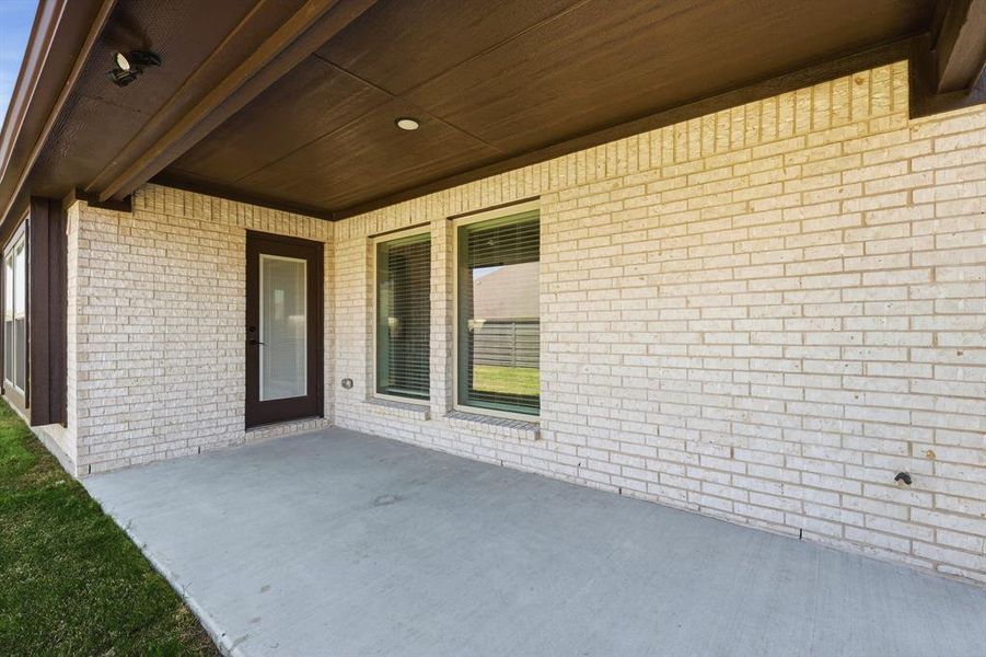 Exterior details and patio area of a home in Union Park, Little Elm (Image 29). Exterior details and patio area of a home in Union Park, Little Elm (Image 29).
