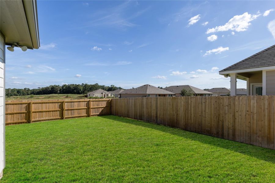 Exterior details and patio area of a home in Rockbridge East, Huntsville (Image 19).