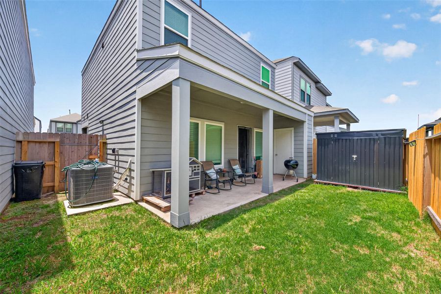 Exterior details and patio area of a home in Antigua, Houston (Image 3).