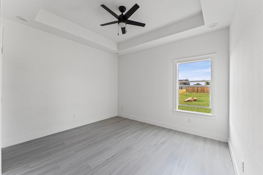 Spacious secondary bedrooms. Photos are representative of the same floor plan built by this builder. Finishes will be the same or similar.