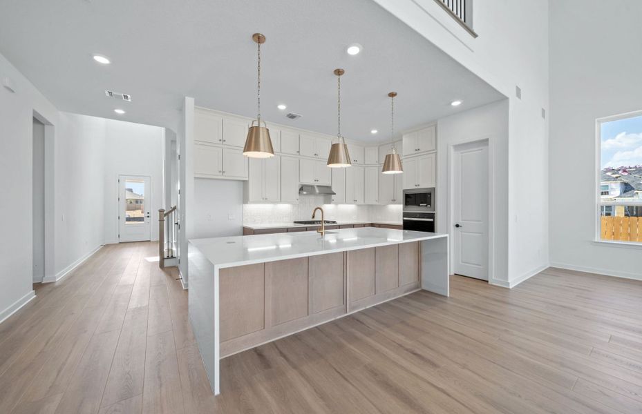 Representative furnished interior of a home built from the Electra by Pulte Homes in 6 Creeks, Kyle (Image 7).