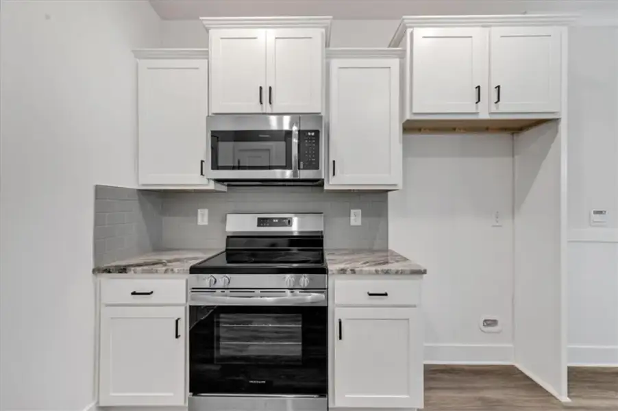 Furnished interior view inside a new home in Canterbury Villas, Carrollton (Image 6).