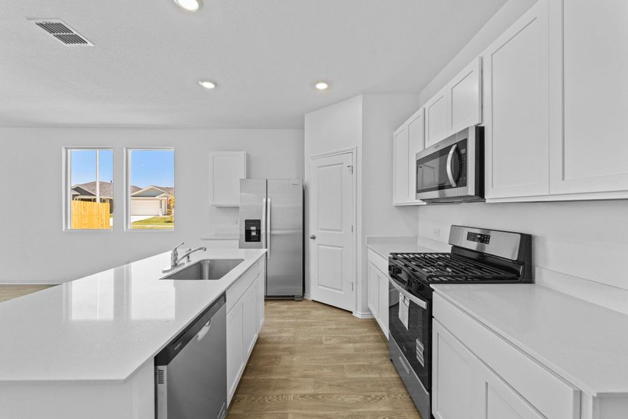 Furnished interior view inside a new home in Valverde, Bastrop (Image 11).