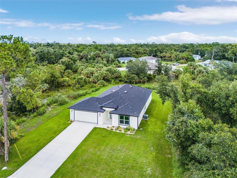 Front exterior of a new home in , North Port, FL, highlighting curb appeal (Image 17).