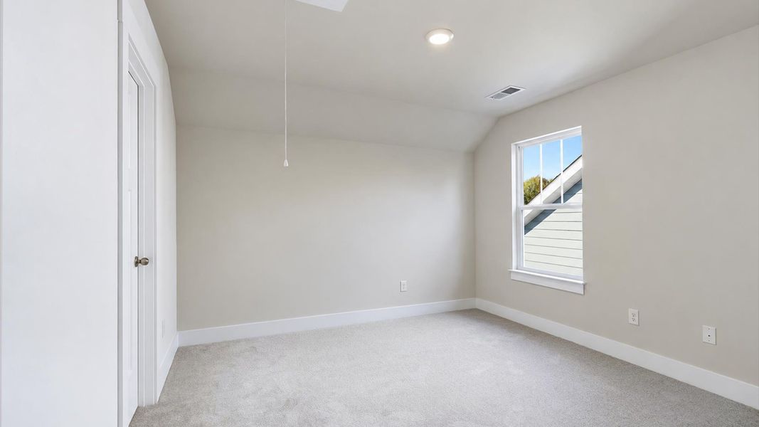 Bright and serene bedroom with comfortable carpeted flooring and a large window for vibrant light at Barton Hollow Bright and serene bedroom with comfortable carpeted flooring and a large window for vibrant light at Barton Hollow