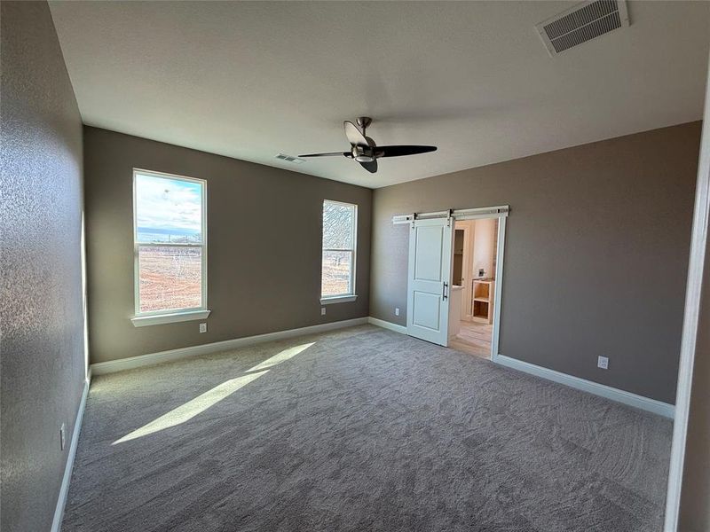 Master bedroom with optional barn door to the master bath.