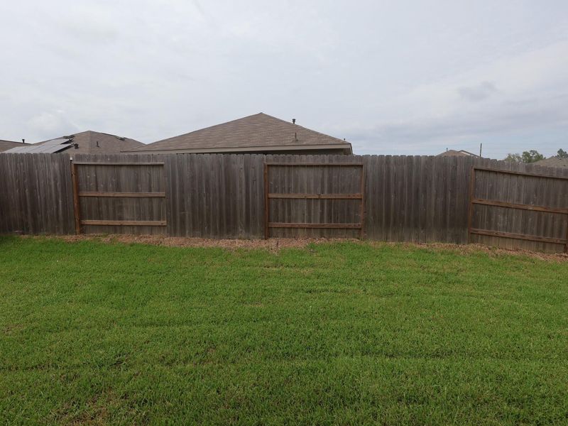 Front exterior of a new home in Moran Ranch, Willis, TX, highlighting curb appeal (Image 5). Front exterior of a new home in Moran Ranch, Willis, TX, highlighting curb appeal (Image 5).