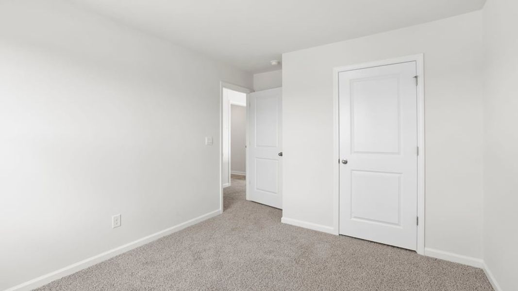 Spacious, unfurnished interior of a new home in Durbin Meadows Traditions, Fountain Inn (Image 30).