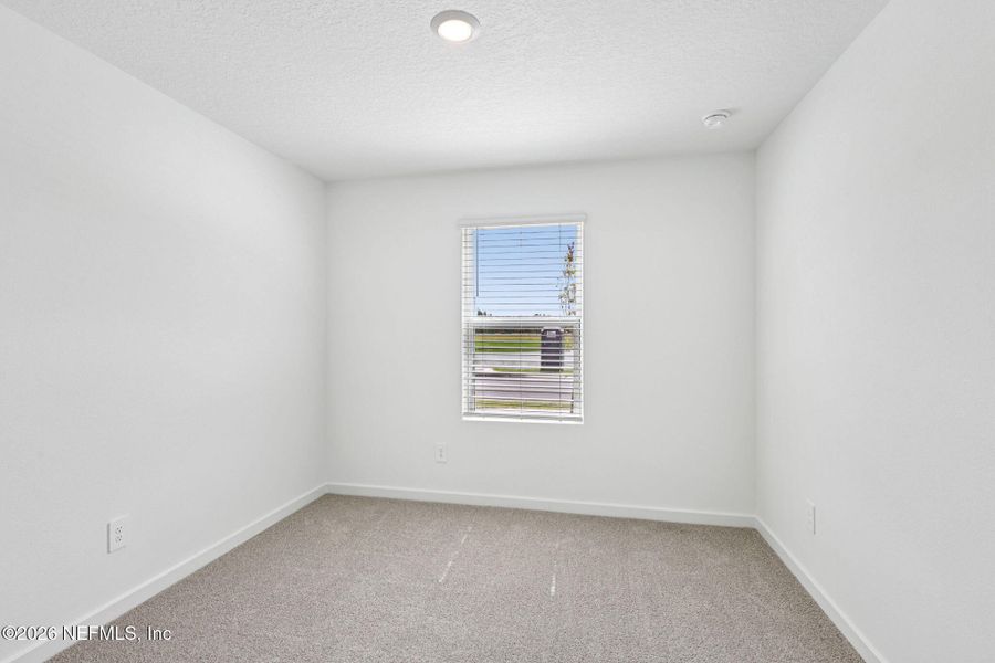 Spacious, unfurnished interior of a new home in Flagler Village - Signature Series, Palm Coast (Image 13).