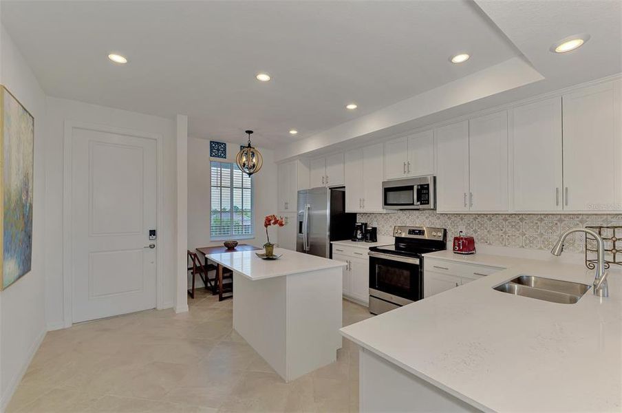 Furnished interior view inside a new home in Wellen Park Golf & Country Club, Venice (Image 7).