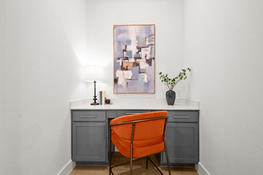 Office with built in desk off the kitchen + living area