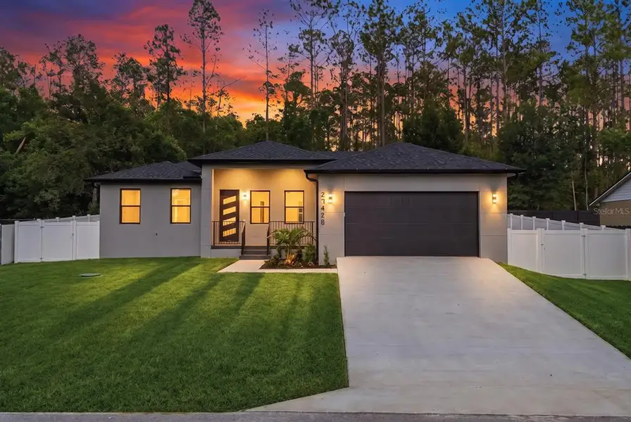 Front exterior of a new home in , Brooksville, FL, highlighting curb appeal (Image 1). Front exterior of a new home in , Brooksville, FL, highlighting curb appeal (Image 1).