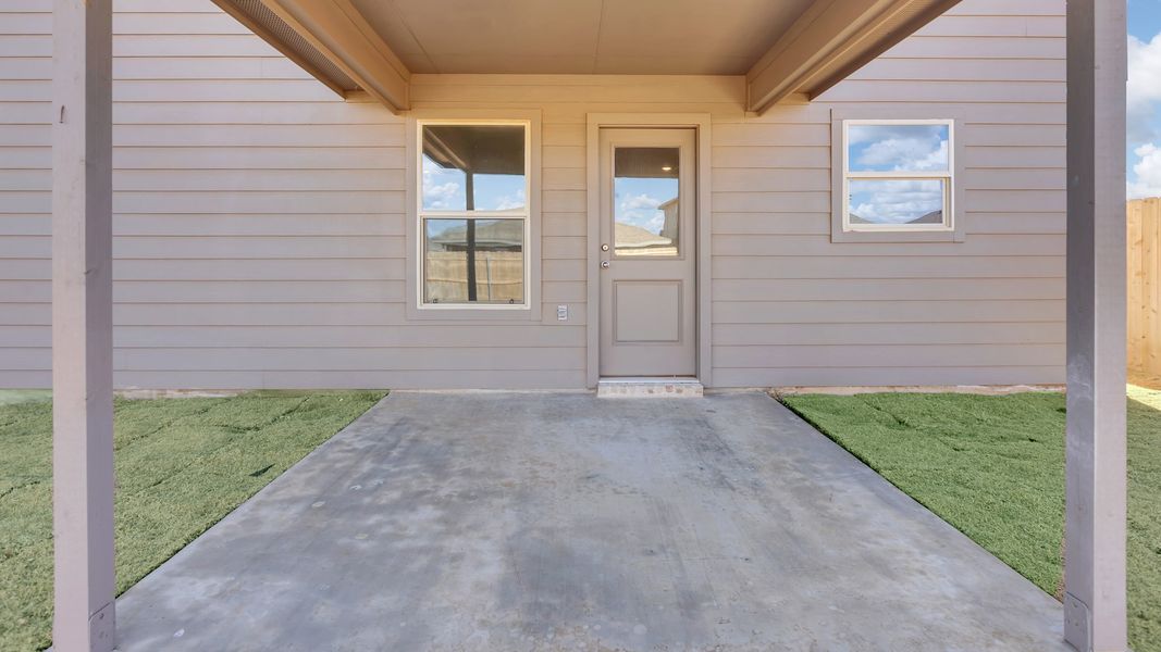 Exterior details and patio area of a home in Overlook West, Wolfforth (Image 3).