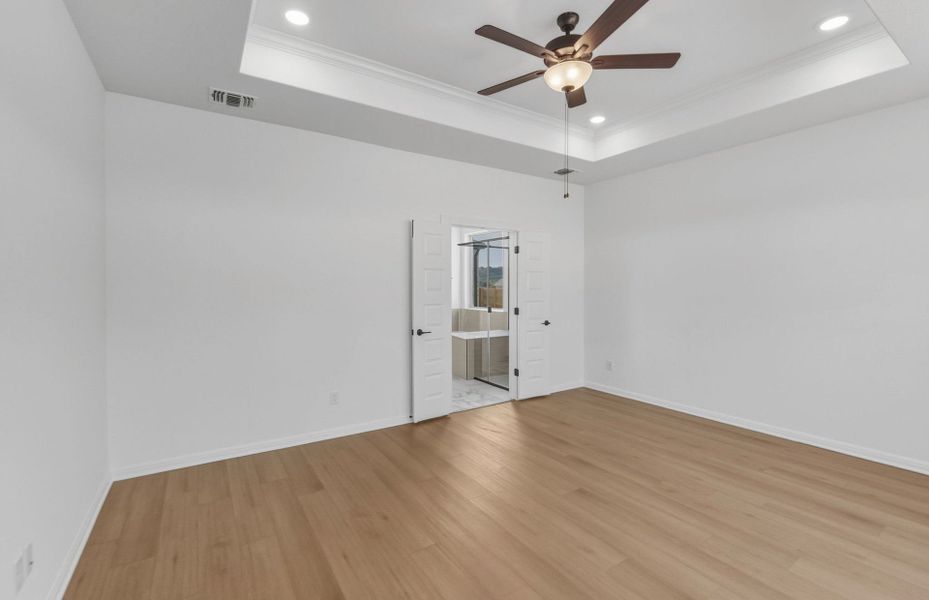 Spacious, unfurnished interior of a new home in Bluffview Reserve, Leander (Image 46).