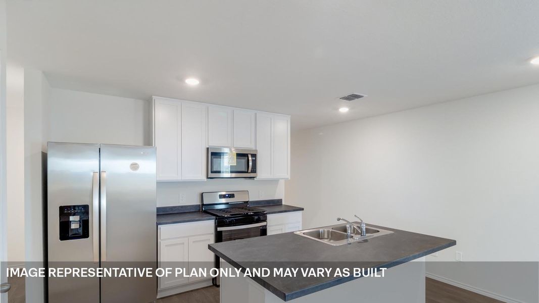 Representative furnished interior of a home built from the The Estero by D.R. Horton in Marigold, Kyle (Image 5).