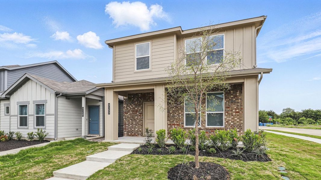 Representative exterior photo of a completed home built from the NUTMEG by D.R. Horton in Orchard Village, Fort Worth, TX (Image 2). Representative exterior photo of a completed home built from the NUTMEG by D.R. Horton in Orchard Village, Fort Worth, TX (Image 2).