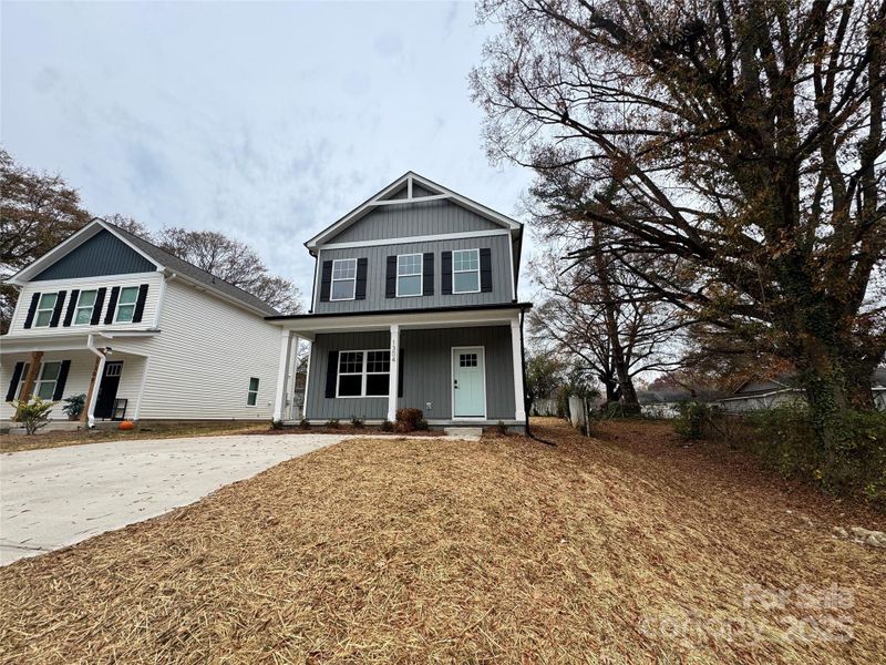 Front exterior of a new home in , Gastonia, NC, highlighting curb appeal (Image 2). Front exterior of a new home in , Gastonia, NC, highlighting curb appeal (Image 2).