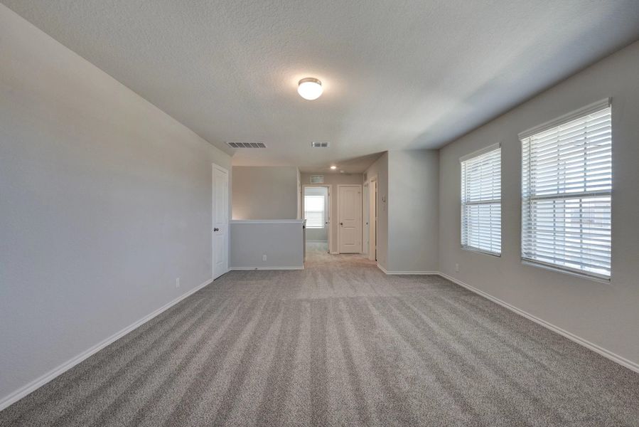 Representative unfurnished interior of a home built from the Devon by Ashton Woods in Cordova Trails, Seguin (Image 16).