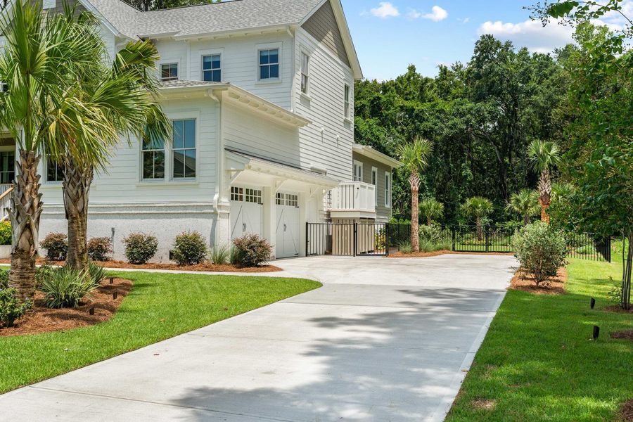 Front exterior of a new home in , Johns Island, SC, highlighting curb appeal (Image 1). Front exterior of a new home in , Johns Island, SC, highlighting curb appeal (Image 1).