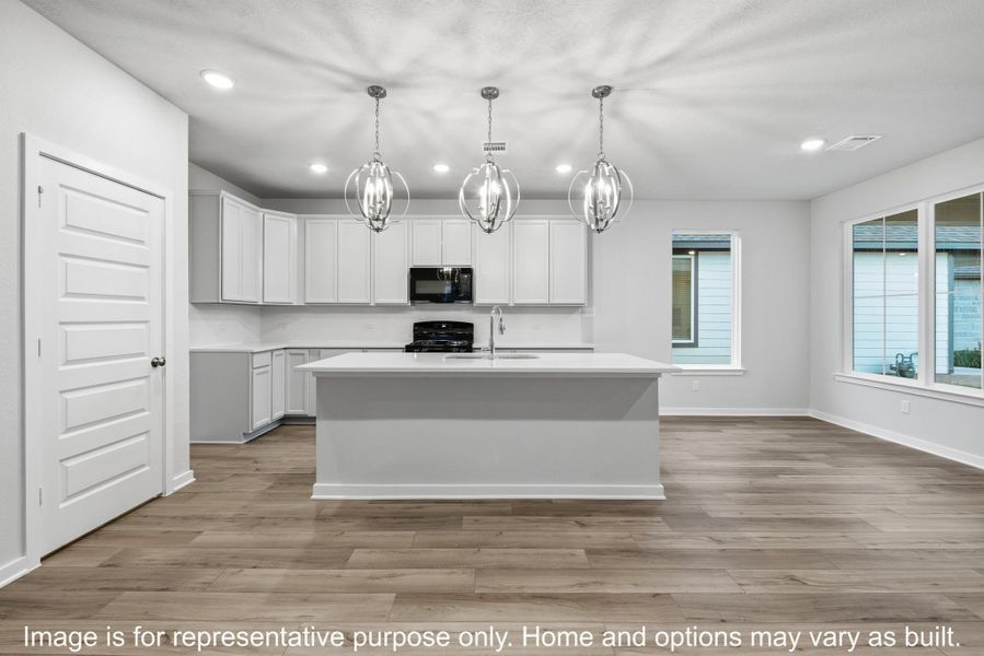 Furnished interior view inside a new home in Heartland at Vintage Farms, Brenham (Image 3).