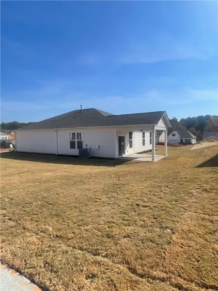 Exterior details and patio area of a home in Springwood Grove, Central (Image 3). Exterior details and patio area of a home in Springwood Grove, Central (Image 3).