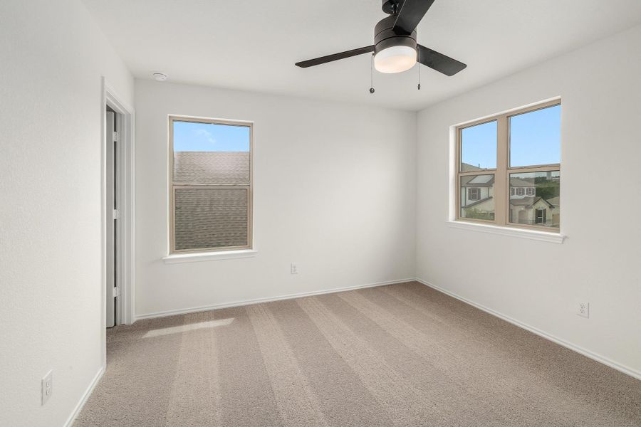 Spacious, unfurnished interior of a new home in River Bluff, Leander (Image 31).