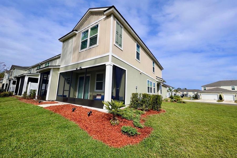 Front exterior of a new home in , Palm Coast, FL, highlighting curb appeal (Image 4).