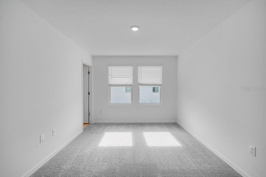 Spacious, unfurnished interior of a new home in The Townhomes at Skye Ranch, Sarasota (Image 31).