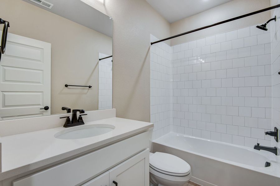 Furnished interior view inside a new home in Reunion, Commerce City (Image 12).
