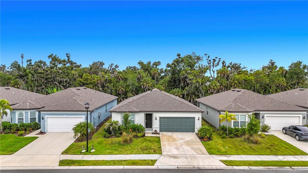 Front exterior of a new home in , Ellenton, FL, highlighting curb appeal (Image 2). Front exterior of a new home in , Ellenton, FL, highlighting curb appeal (Image 2).